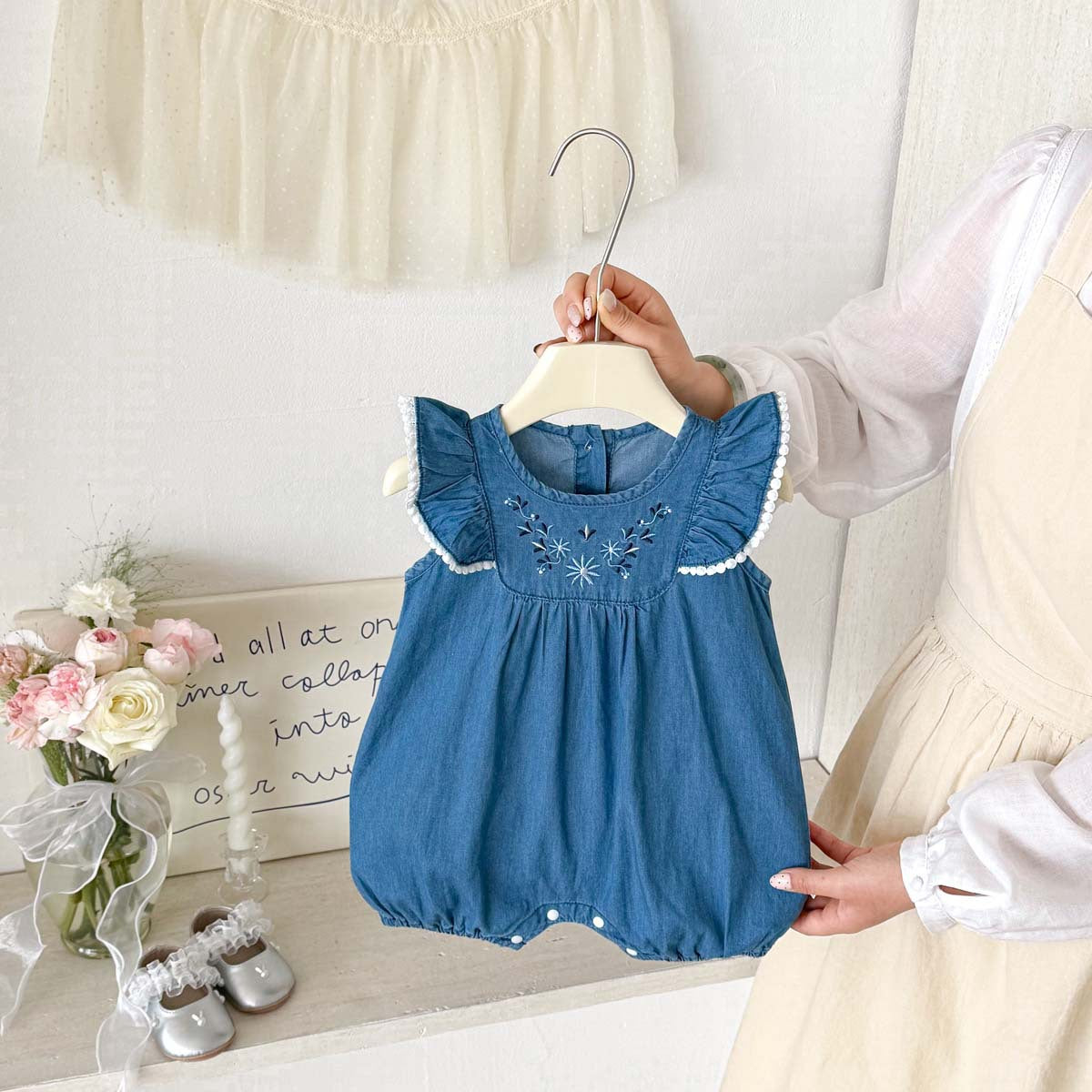 Embroidered Denim Flutter Romper – Lace Trim Bubble Bodysuit (0–18M)
