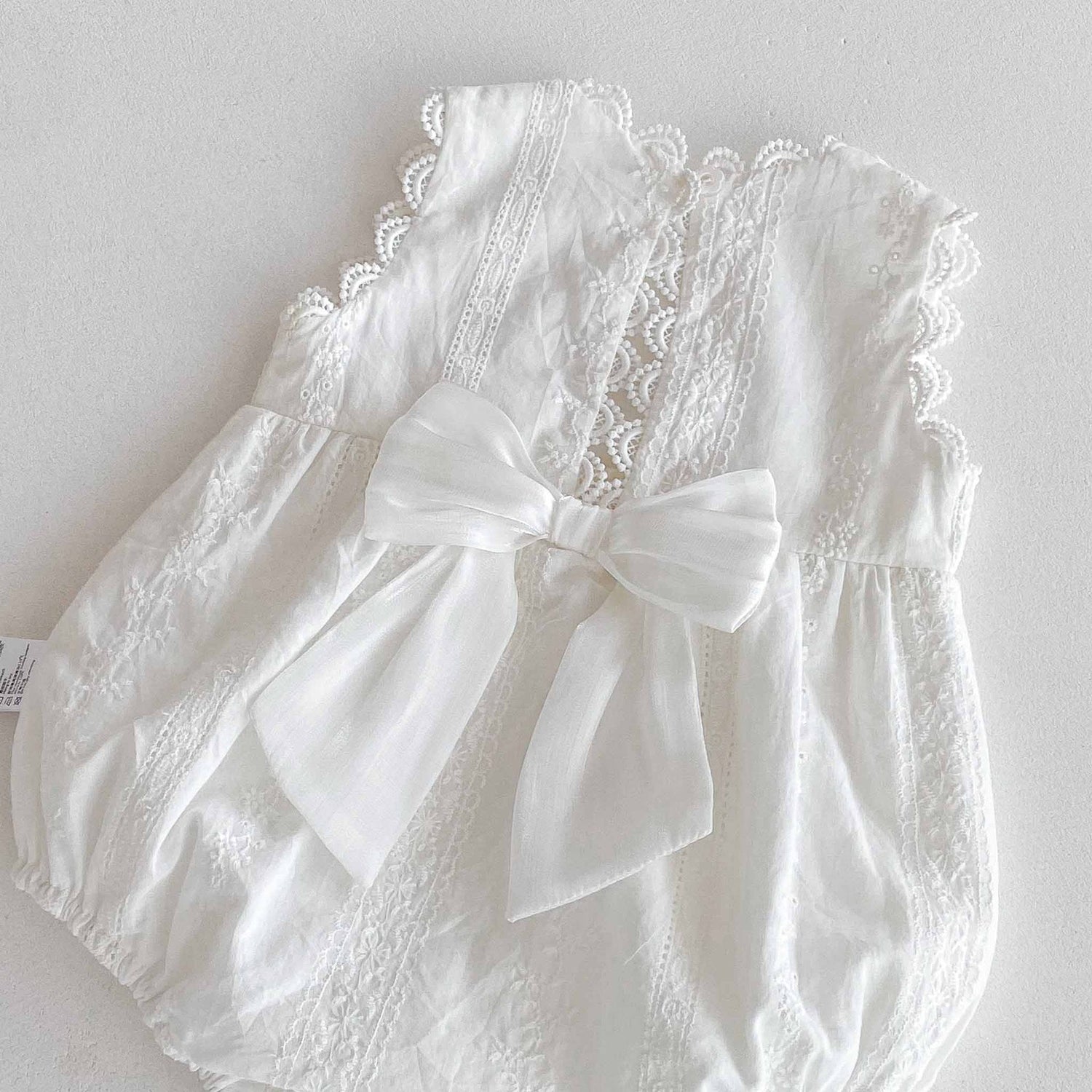 White Cotton Sleeveless Romper – Korean Style Snap Bodysuit (0–18M)    Mimou Babywear