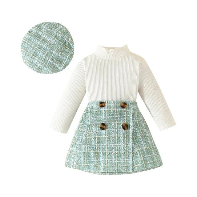 Baby girl knit set with plaid skirt and hat in green, front view