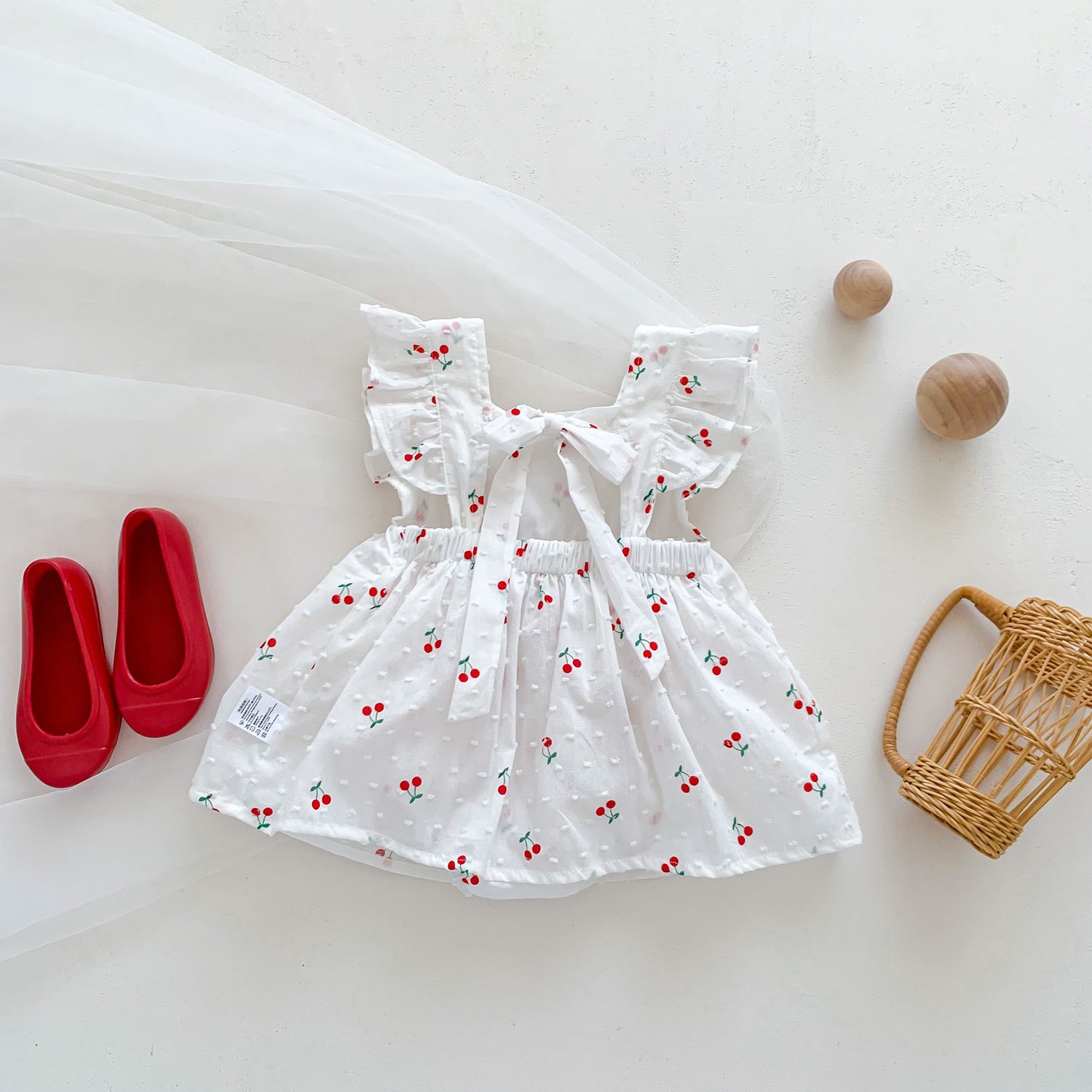 Cherry Swiss Dot Bow Romper Dress – Flutter Sleeve Tie-Waist Bodysuit (0–18M)