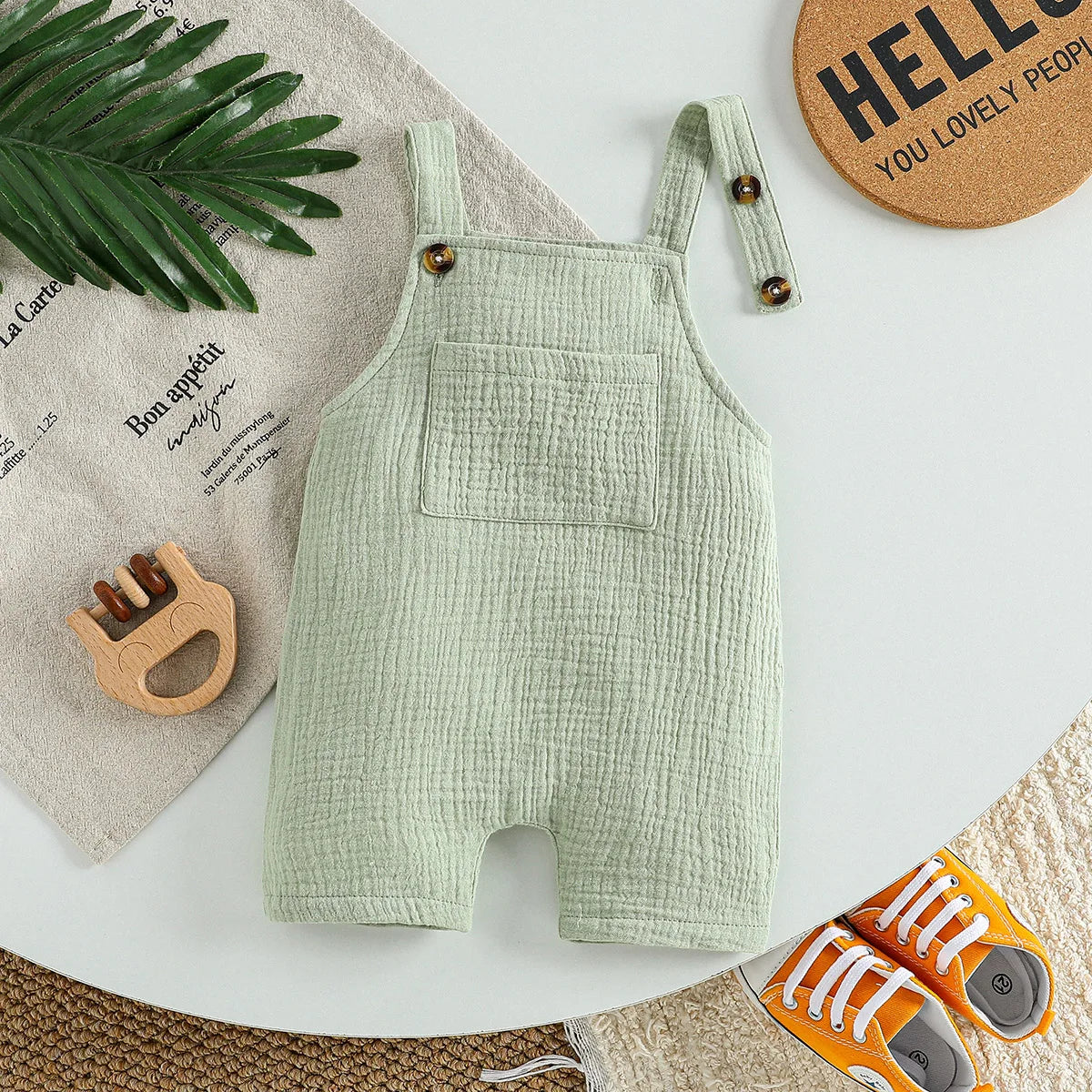 Sleeveless Cotton Muslin Baby Romper with Button Straps (0–18M)    Mimou Babywear