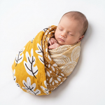 Botanical Print Muslin Swaddle Blanket newborn lifestyle photo