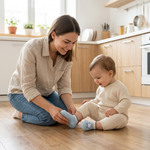 Cartoon Character Sock Shoes mother putting shoes on baby girl kitchen lifestyle photo