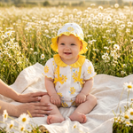 Sunny Daisy Romper & Bucket Hat Set baby girl daisy meadow lifestyle photo